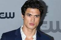 How tall is Charles Melton?